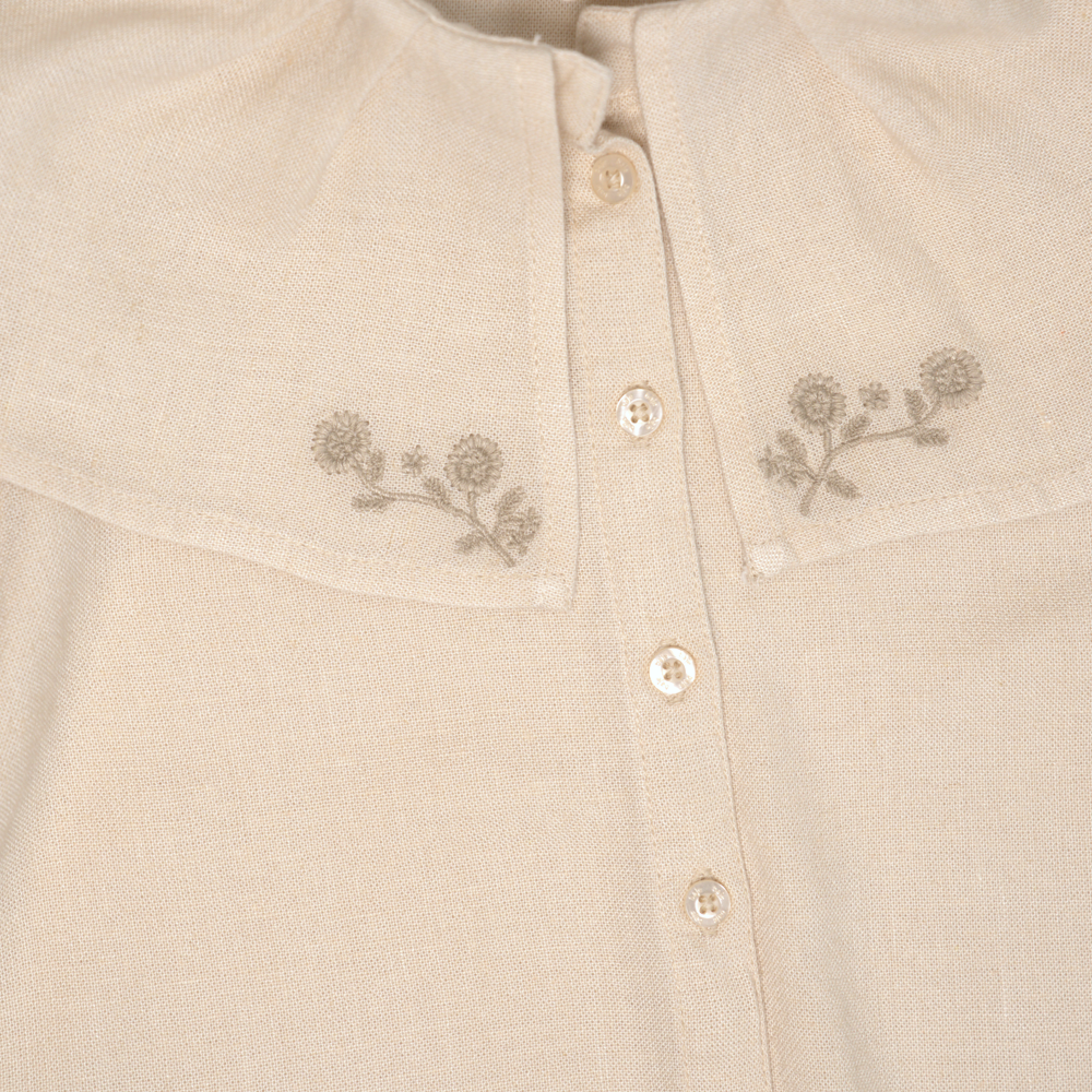 
                      
                        Ruby blouse | sand
                      
                    